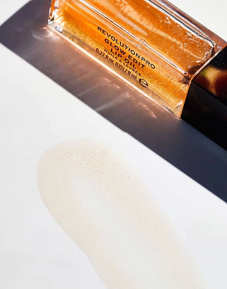 Revolution Pro Glow Edit Lip Oil Soleil Orange For Unisex 2 Revolution Pro Glow Edit Lip Oil Soleil Orange For Unisex - Image 2