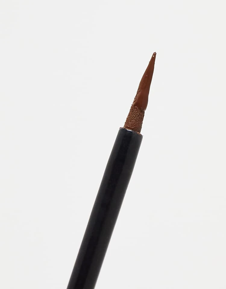 Revolution Super Flick Liquid Eyeliner Brown For Unisex 2 Revolution Super Flick Liquid Eyeliner Brown For Unisex - Image 2